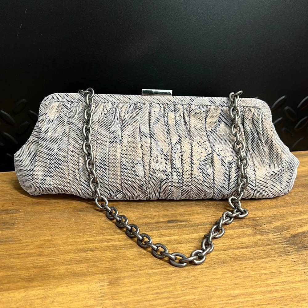 Pristine Danier leather gold/purple python clutch